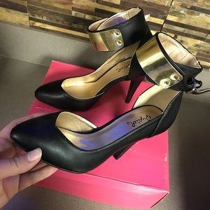 new black heels with gold ankle buckle